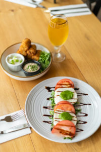 tater kegs and Caprese salad