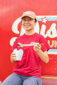 Sola enjoying one of her dumplings