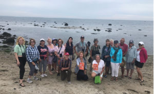 Walking Book Tour participants on the beach at West Island, Fairhaven