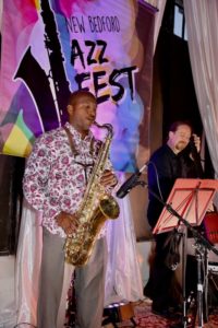 Saxophone and bass players at the New Bedford Jazz Festival