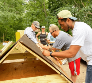 volunteers building structures