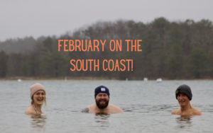 Three people in Onset Bay during winter