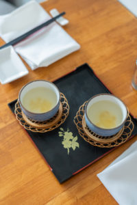 Two cups of William's homemade tea on a tray