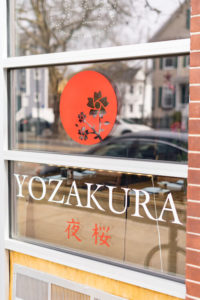 The storefront of Yozakura Sushi