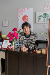 William Foley behind the desk at Yozakura Sushi