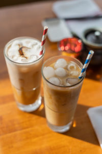 Two specialty coffee drinks at Yozakura Sushi