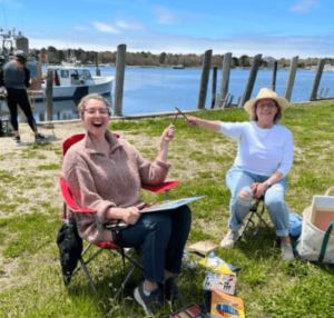 Plein air painters by the water