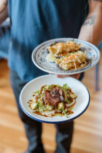 Chef Swierkowski with two favorite dishes