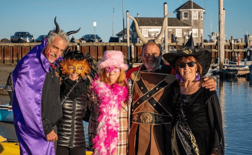 Adults in Halloween costumes on Onset Beach