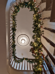 looking up at the garlanded staircase of the Rotch-Jones-Duff House