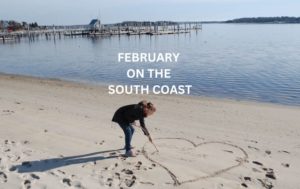 Drawing a heart on the beach