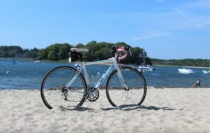A bicycle on the beach at Onset Harbor