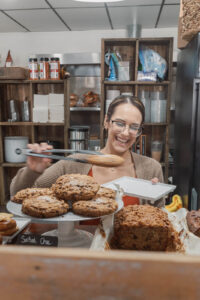 Chelsea working behind the counter at Christopher's