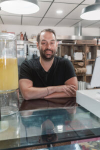Nathan at the counter at Christopher's