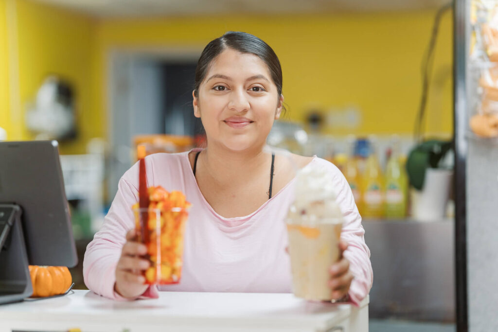 Jackie at the counter of La Fruta Loca