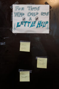 post its tacked up on the refrigerator, under a sign that says "For those who could use a little help"