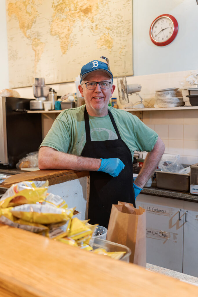 Devin Byrne, behind the counter