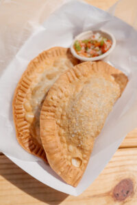 Hot beef or chicken pastel (Brazilian empanada).