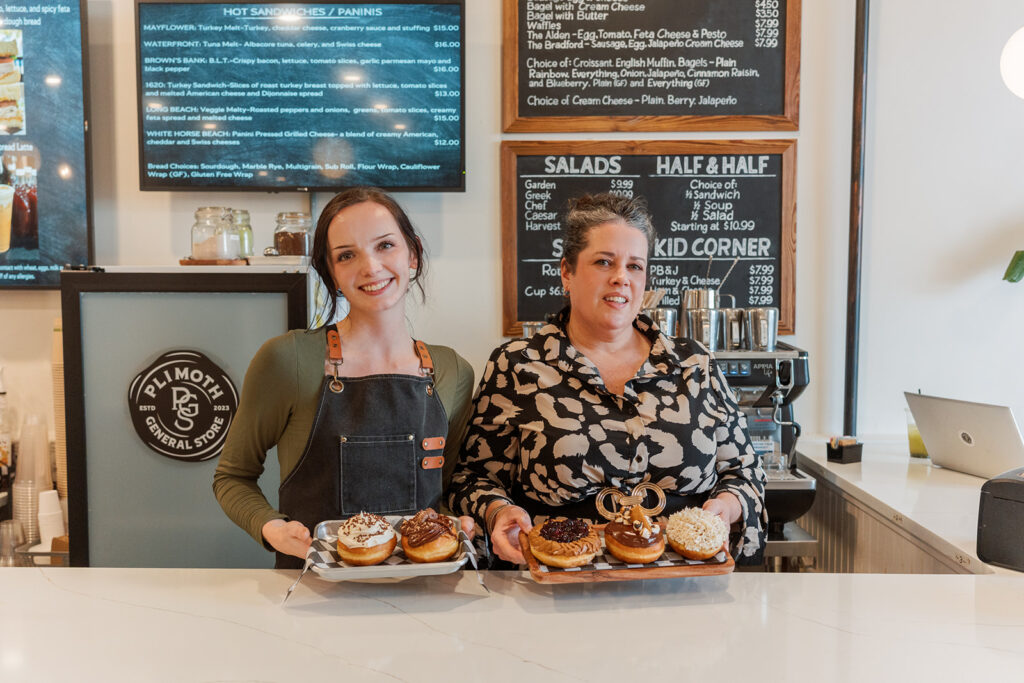 Barista with Tatum Steward at the counter of Plimoth General Store
