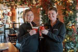 Bartenders Jessie and Jillian with two holiday drink specials