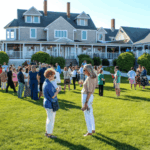 People milling on the lawn of the Mattapoisett YMCA