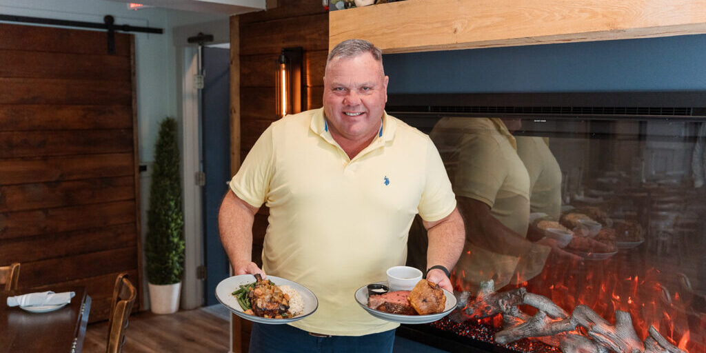 Owner Michael Dearing with two dishes
