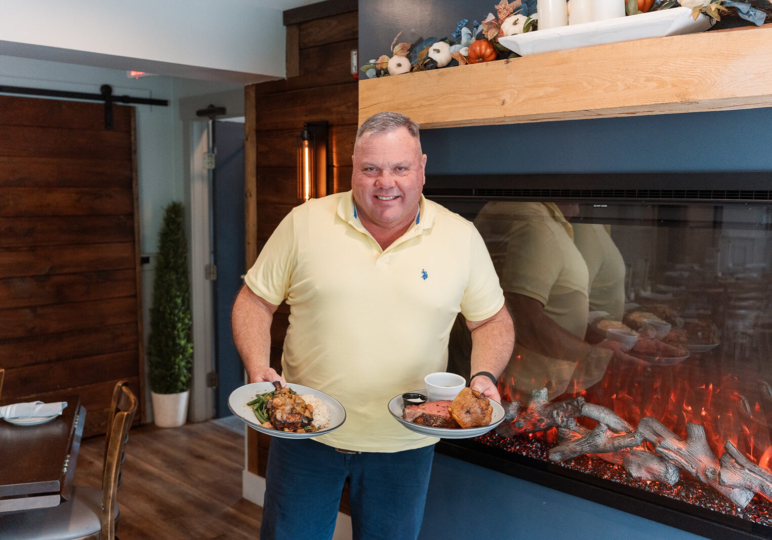 Owner Michael Dearing with two dishes