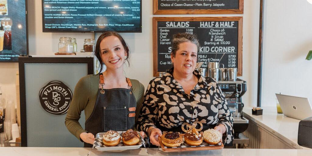 Barista with Tatum Steward at the counter of Plimoth General Store