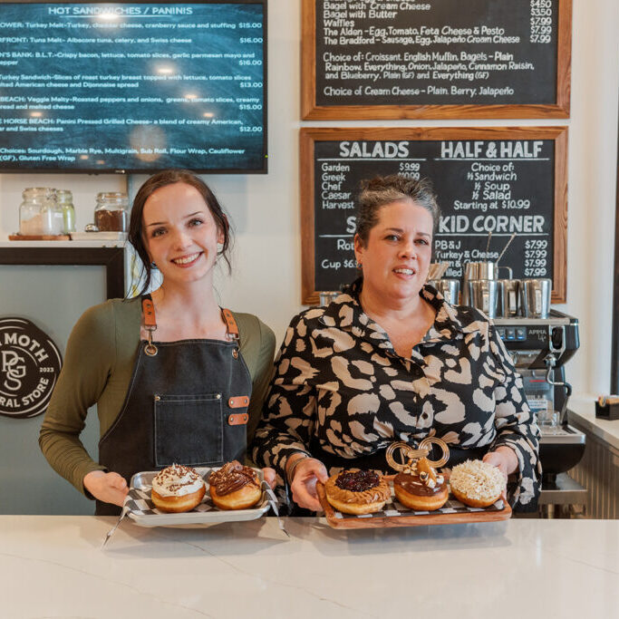 Barista with Tatum Steward at the counter of Plimoth General Store