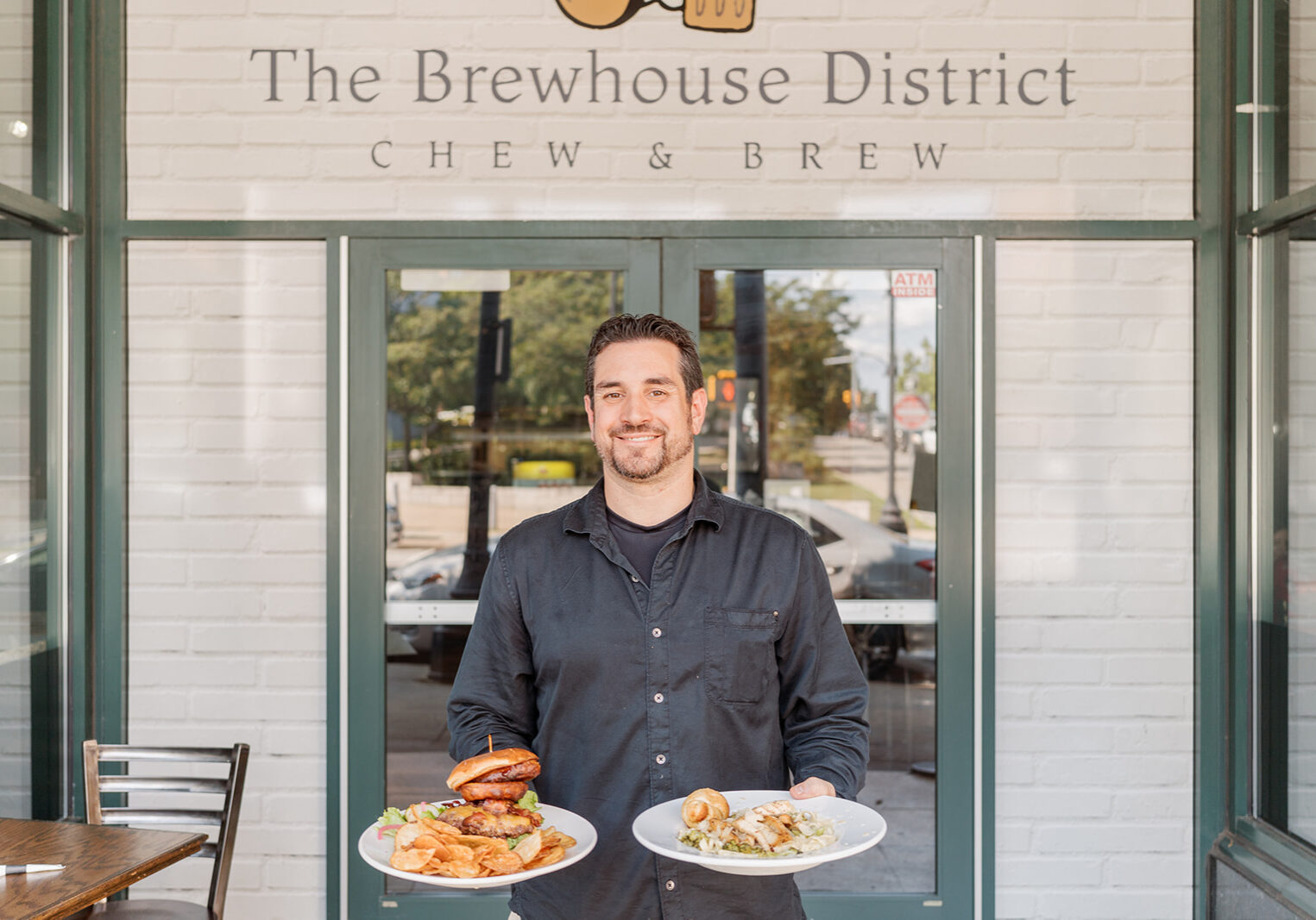 Nick standing at the door of the Brewhouse District