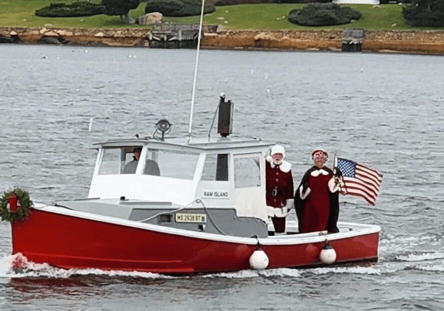 Mr. and Mrs. Claus on a motor boat